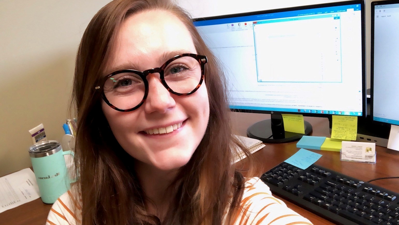 Kendyl Larson working in her office.